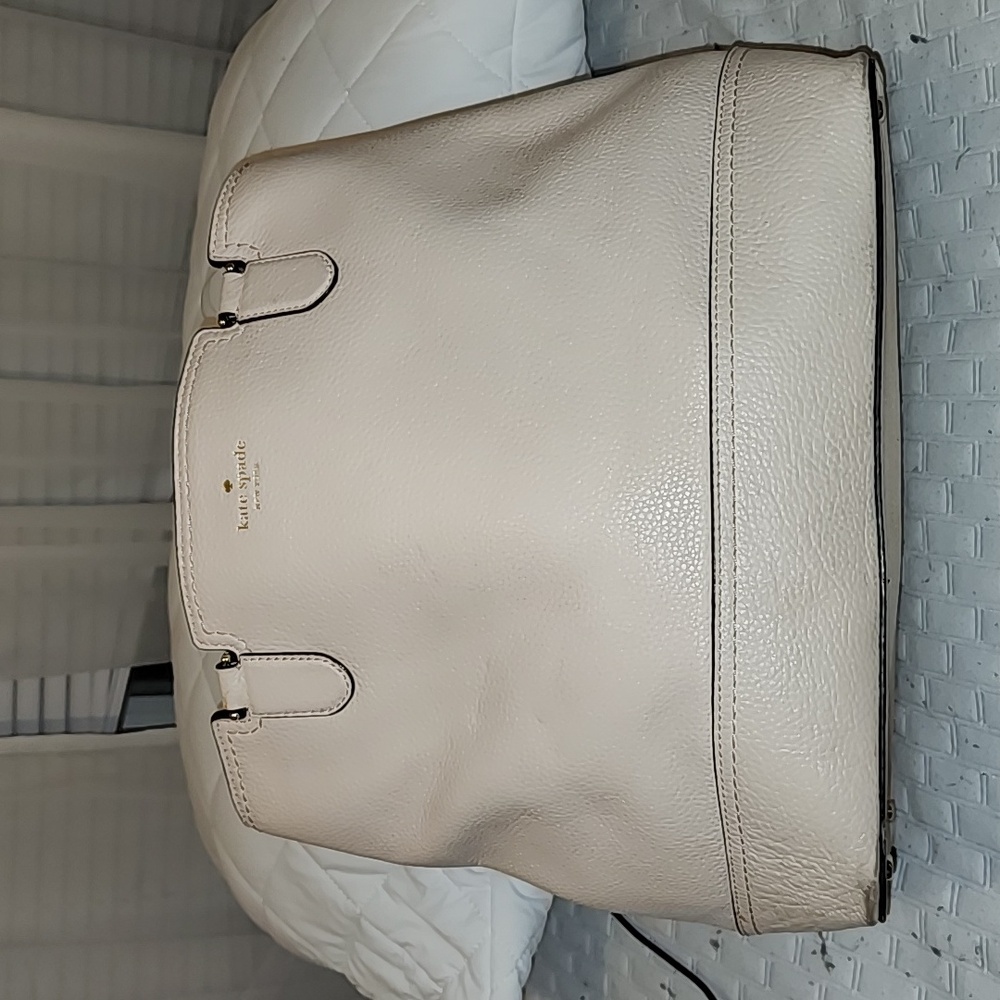 Kate Spade leather purse, GUC. Price reflects condition of bag, but she a beauty